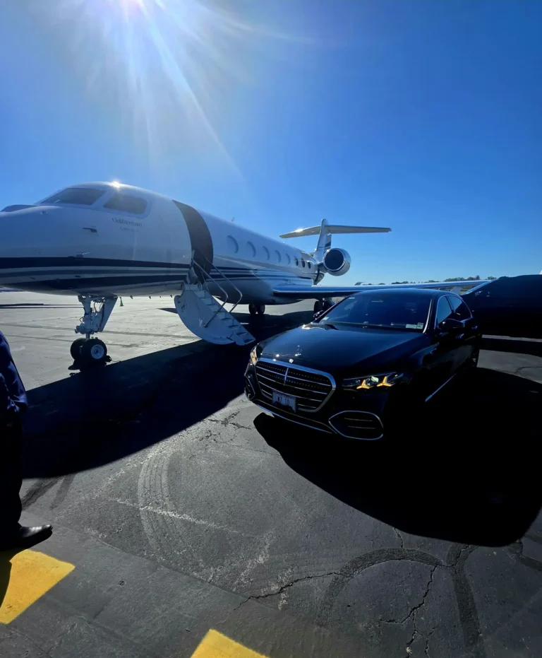 MZ RIDE Mercedes S-Class waiting planeside next to a private jet for an FBO pickup