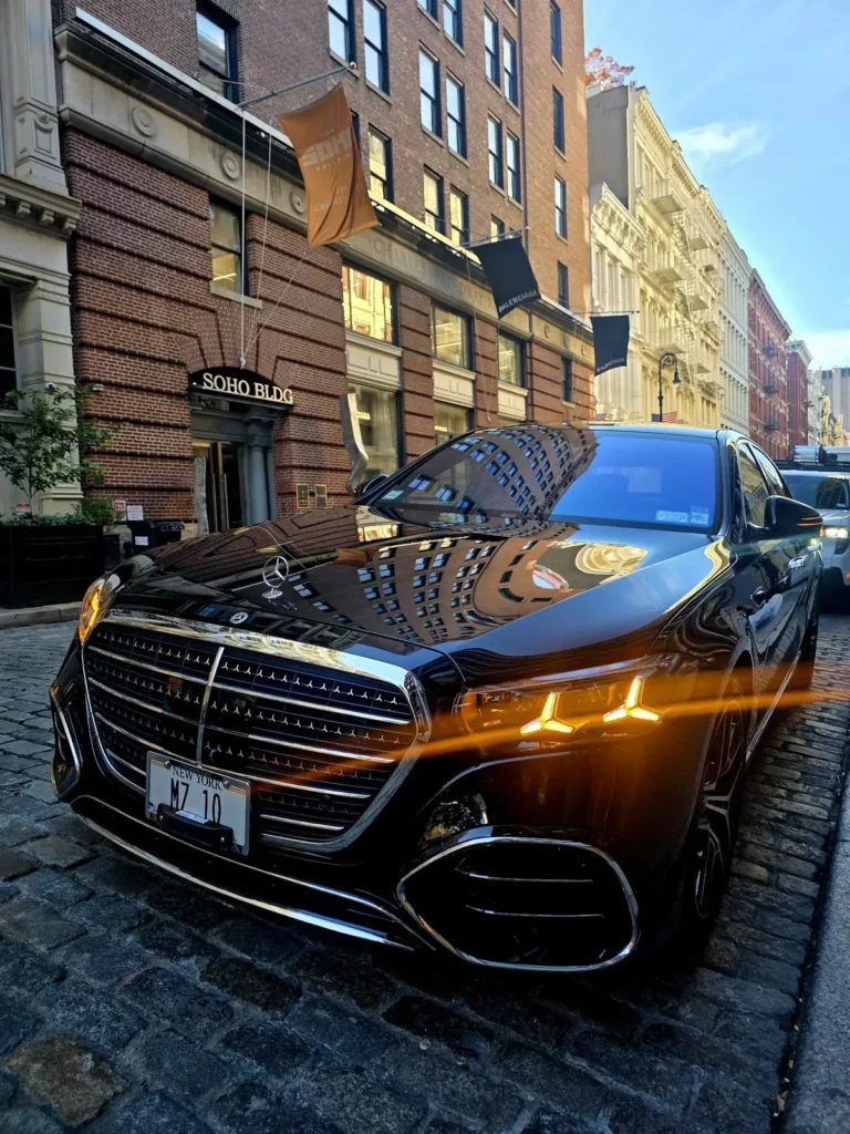 Black Mercedes-Benz S580 chauffeur sedan on a cobblestone street in SoHo, Manhattan - MZ RIDE